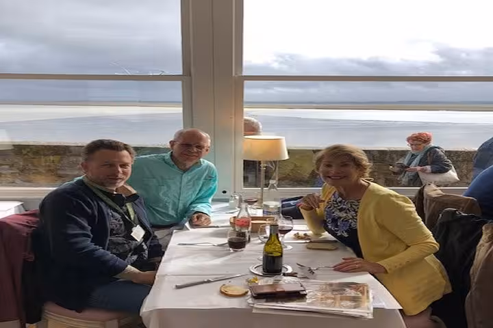 Lunch tasting with guests overlooking the Normandy coast, private Bayeux food tour featuring local specialties