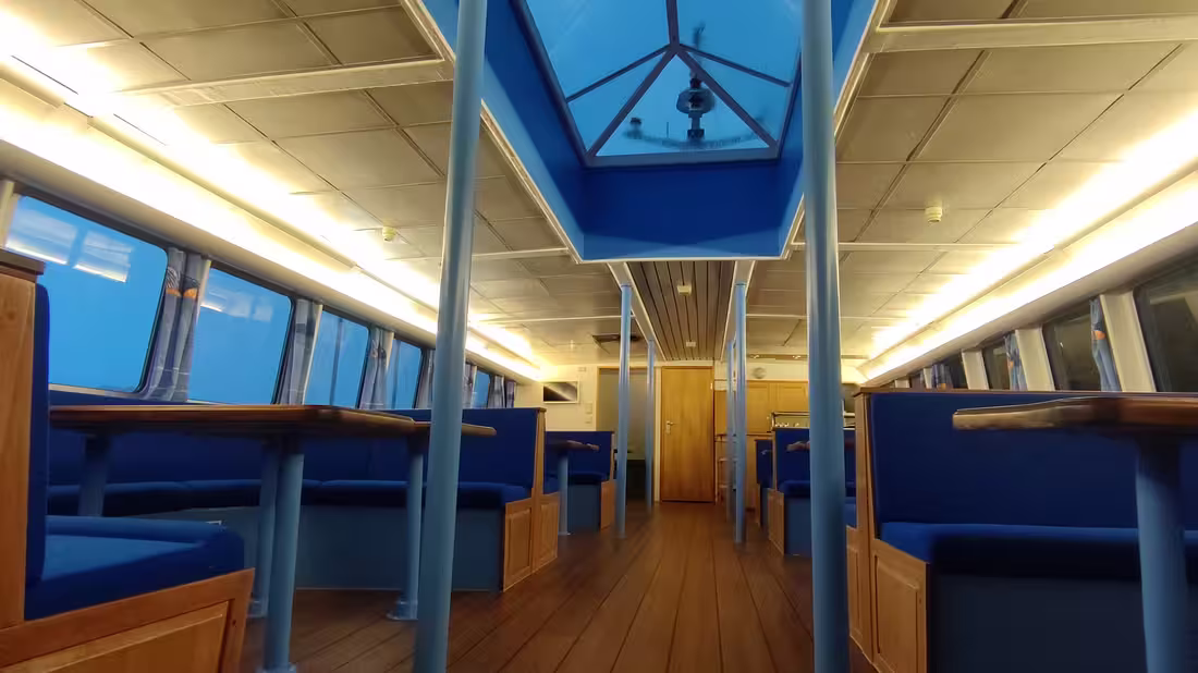 Inside of a boat used to spot the Northern Lights with view of the double observation deck