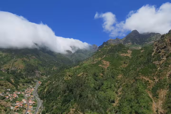 Breathtaking view of lush green terraces and volcanic landscape on a sunny day, ideal for a 4x4 tour in the Northwest.