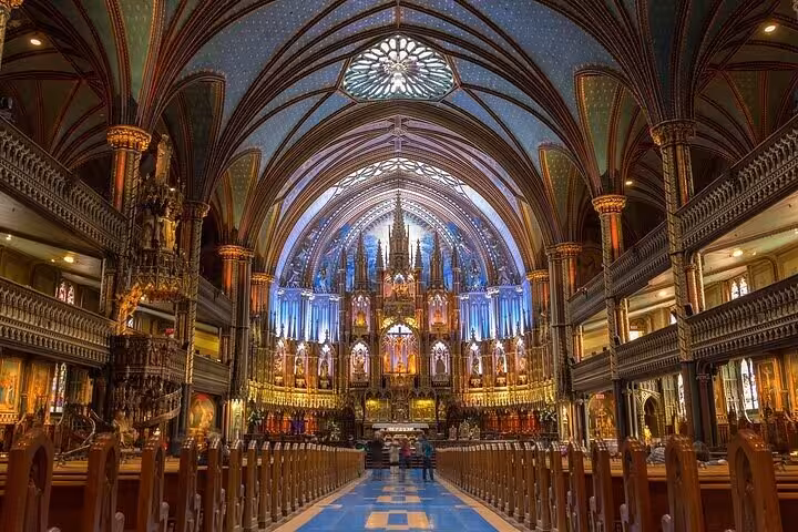 Stunning interior of Notre Dame Cathedral Paris with Gothic vaulted ceilings and glowing blue altar on walking tour
