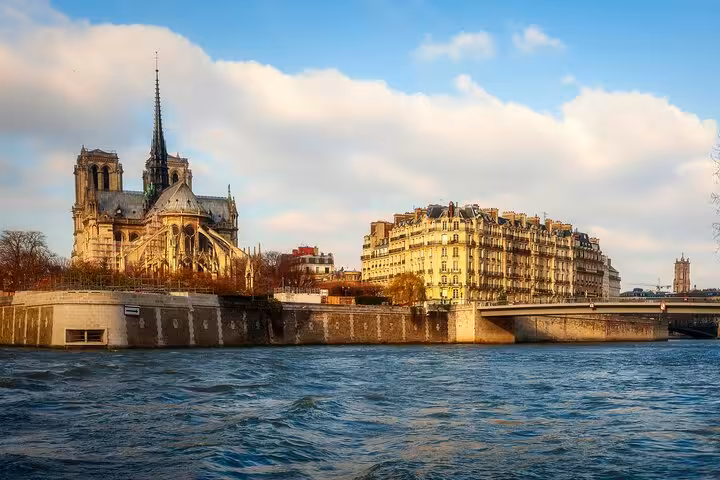 Notre Dame Cathedral and Haussmann buildings viewed from the Seine River in Paris