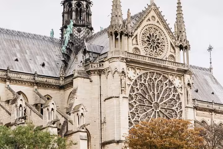 Notre-Dame Paris exterior with rose window and Gothic details, great for a family and kids outside tour