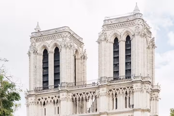 Close-up of Notre-Dame Cathedral twin towers in Paris, ideal for a kid-friendly outside guided tour