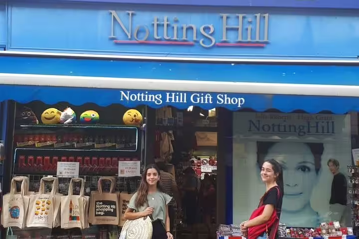 Visitors enjoy shopping at the iconic Notting Hill Gift Shop, a highlight of the London private tour through vibrant markets.