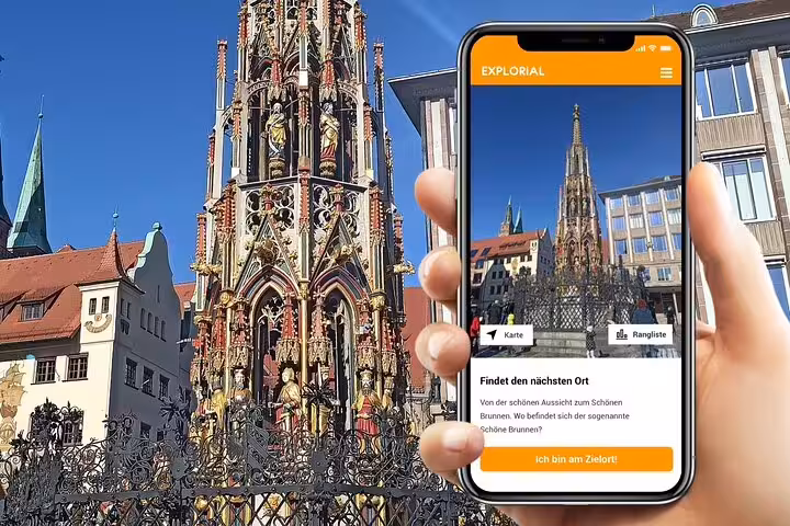 Phone app guiding Nuremberg scavenger hunt tour at Schöner Brunnen fountain in Hauptmarkt Old Town