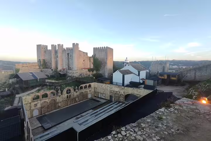 Explore the historic charm of Óbidos Castle with its ancient walls and scenic views, a highlight of Portuguese heritage.