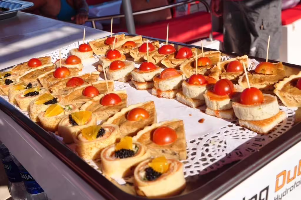 Gourmet canapés and snacks served on board Ocean Diva Catamaran, luxury sailing cruise with catering