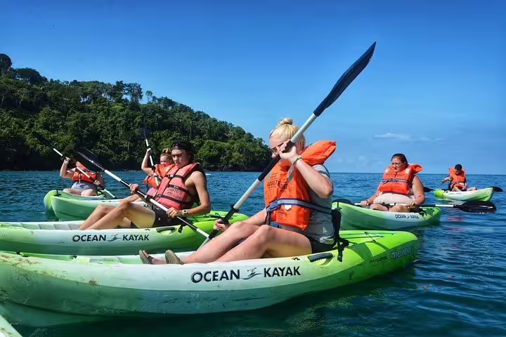 Group kayaking experience in Manuel Antonio's clear waters, ideal for adventure seekers exploring Costa Rica's coast.
