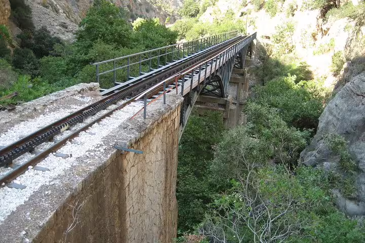 Scenic Odontotos railway trestle above Vouraikos Gorge near Kalavryta on Cave of Lakes full day tour