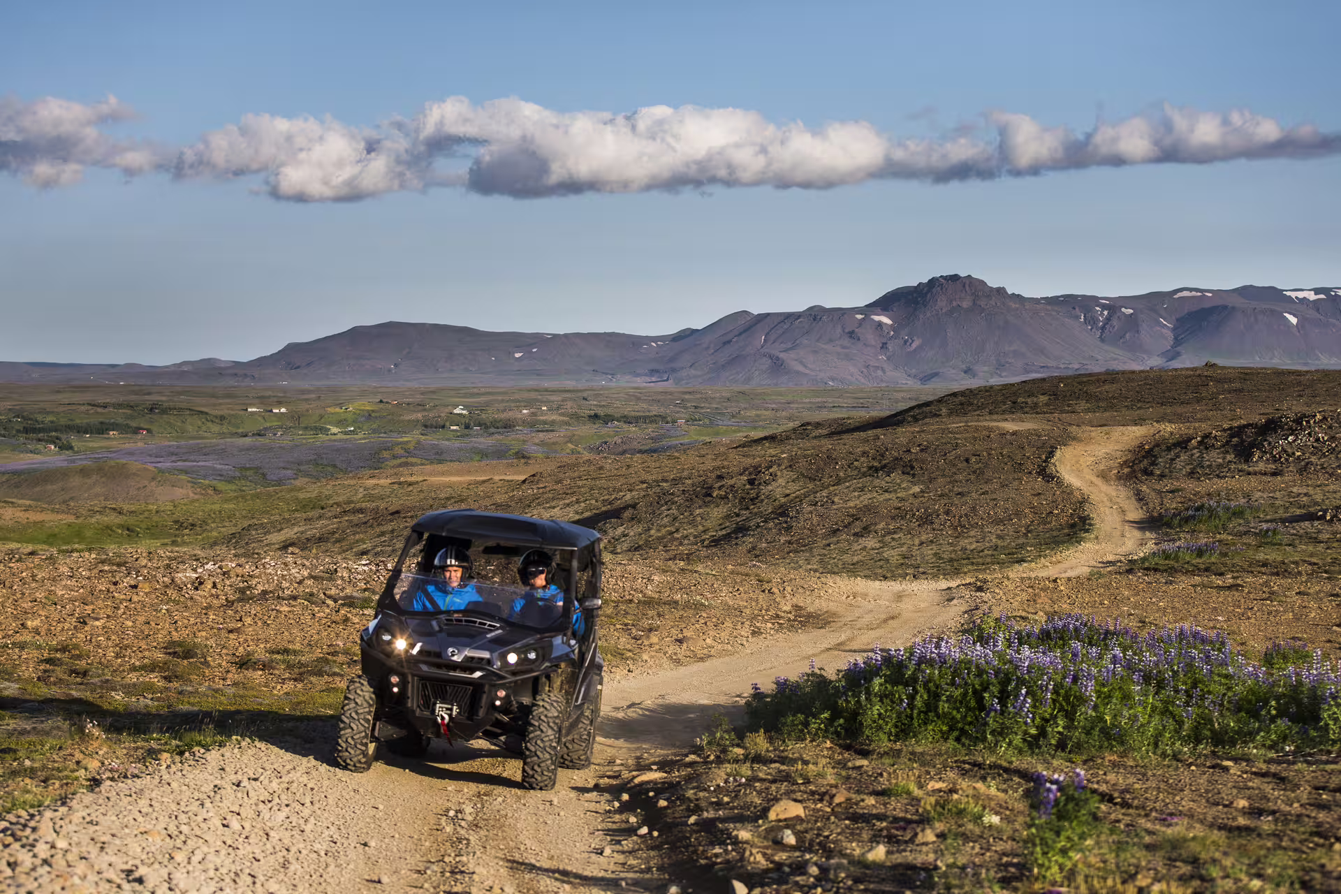 Off-road buggy adventure through rugged lava fields with scenic mountain views, perfect for a thrilling 2-hour Iceland tour.