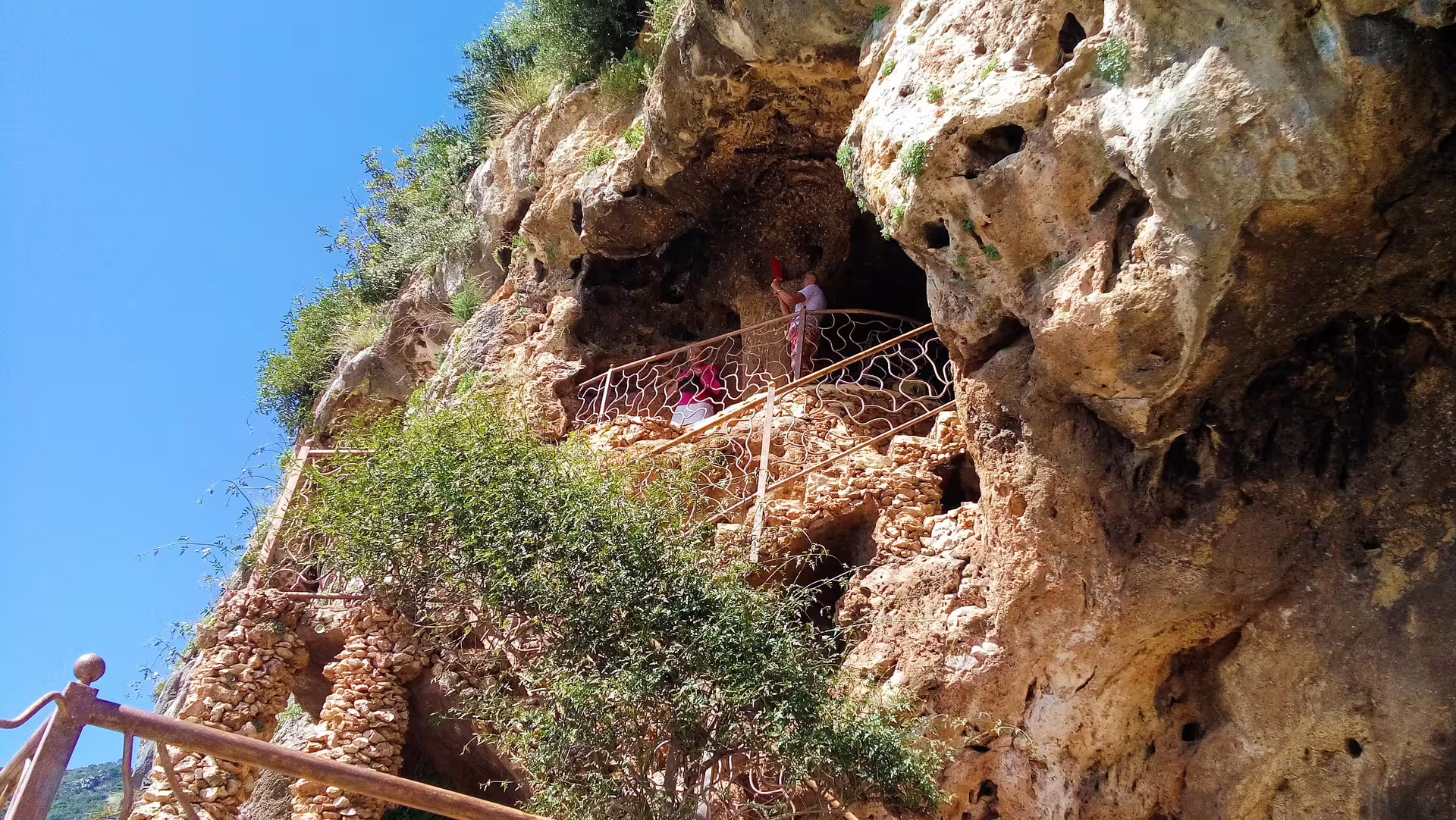 Rocky cave viewpoint and stairway near Ojen, scenic stop on a private walking tour through Andalusian nature