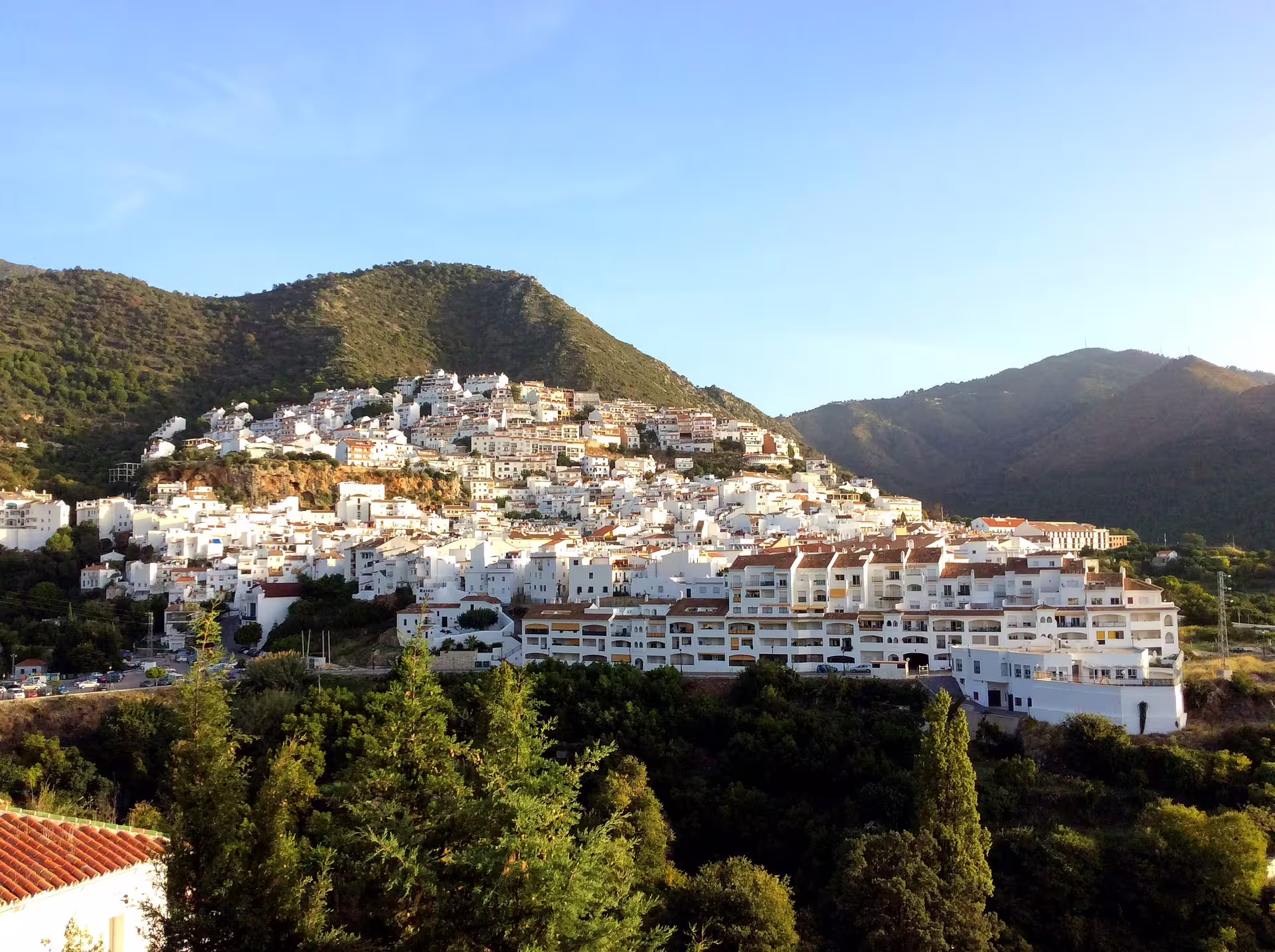Panoramic view of whitewashed Ojen village nestled in the Sierra de las Nieves, on a private tour from Costa del Sol
