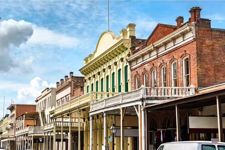 Historic Victorian storefronts with covered walkways along Old Sacramento's charming main street