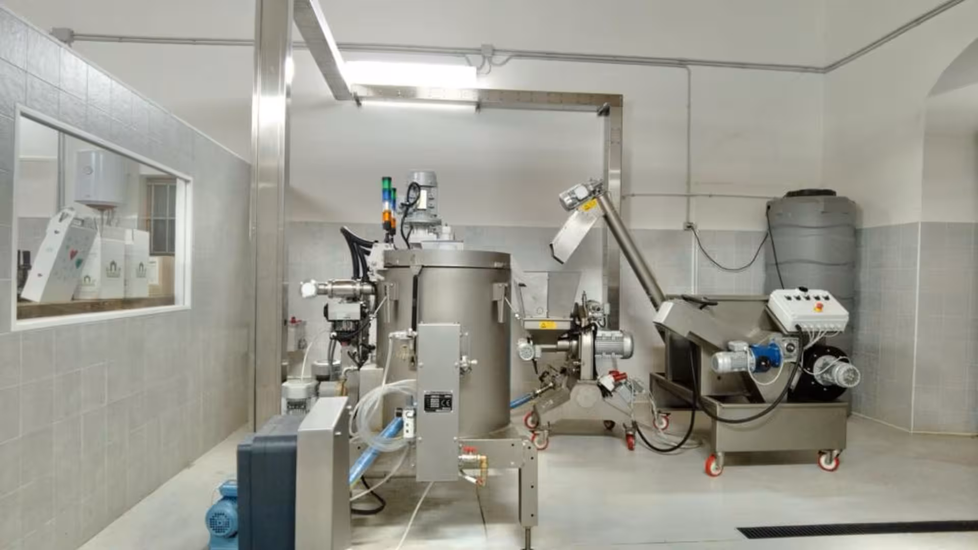 State-of-the-art olive oil processing equipment in Oristano tasting tour.