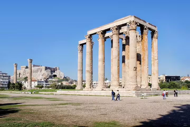 Temple of Olympian Zeus columns with Acropolis in the distance on a full-day private Athens tour