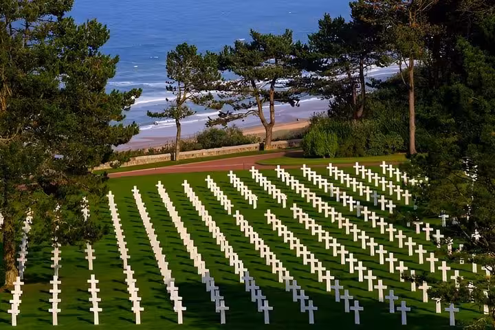 Rows of white crosses at Normandy American Cemetery overlooking Omaha Beach, France