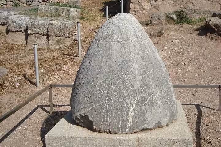 Omphalos stone at Delphi archaeological site, must-see highlight on Thermopylae and Delphi day trip from Athens