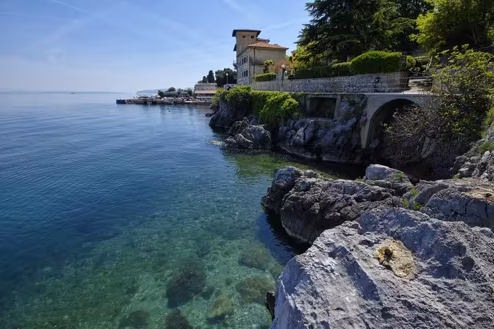 Opatija seaside promenade and rocky Adriatic coast, scenic stop on private tour from Zagreb to Rijeka