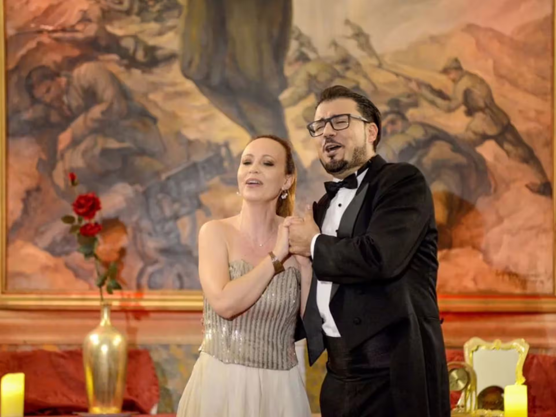 Elegant opera duet enchants audience in Verona Palace, offering a unique Italian cultural experience with prosecco.
