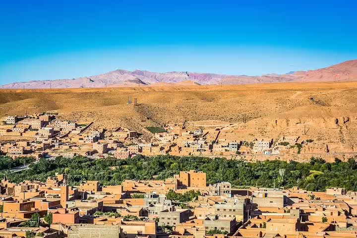 Panoramic view of Ouarzazate oasis town and Atlas foothills on Morocco 9-day Tangier to Marrakech tour