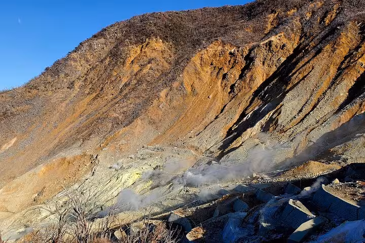 Steaming volcanic terrain of Owakudani in Hakone, a highlight of the Mt. Fuji customizable private tour.