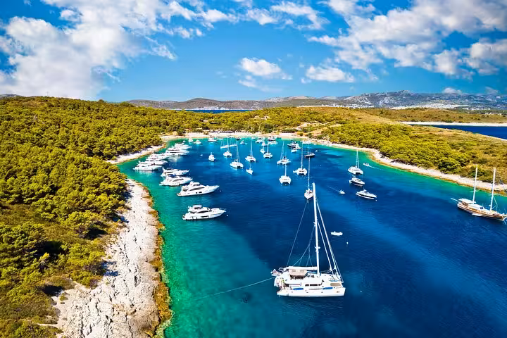 Aerial view of Pakleni Islands bay with yachts in turquoise water on Hvar and Vis speedboat tour