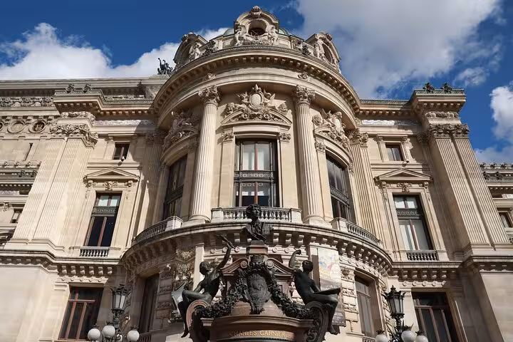 Close-up of ornate Palais Garnier facade, Haussmann-era architecture highlight on Napoleon III Paris city tour