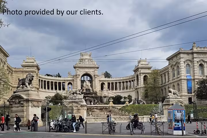 Palais Longchamp in Marseille with fountains and statues, landmark visit on private driver city tour