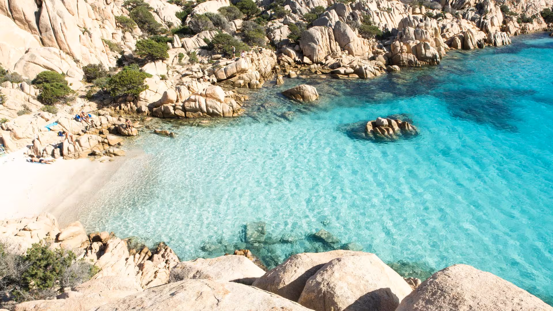 Turquoise waters and rocky coastline of the La Maddalena Archipelago, a stunning destination for private RIB tours.