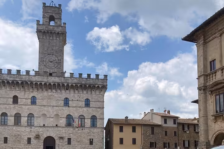 Explore the historic Palazzo Comunale in Montepulciano, featuring medieval architecture on the Rome to Florence tour.