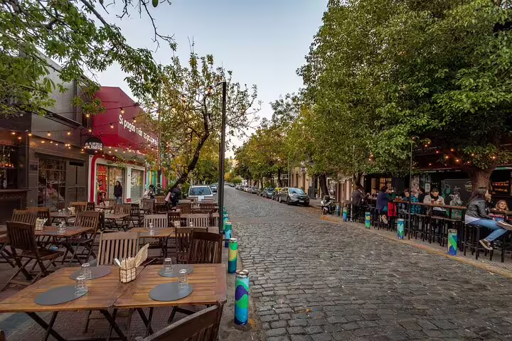 Palermo Soho cobblestone street with outdoor cafes in Buenos Aires, ideal for a 2-hour private tour