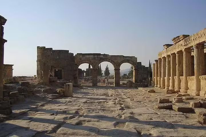 Explore ancient ruins of Hierapolis on the Pamukkale Day Tour from Istanbul with stunning historical architecture.