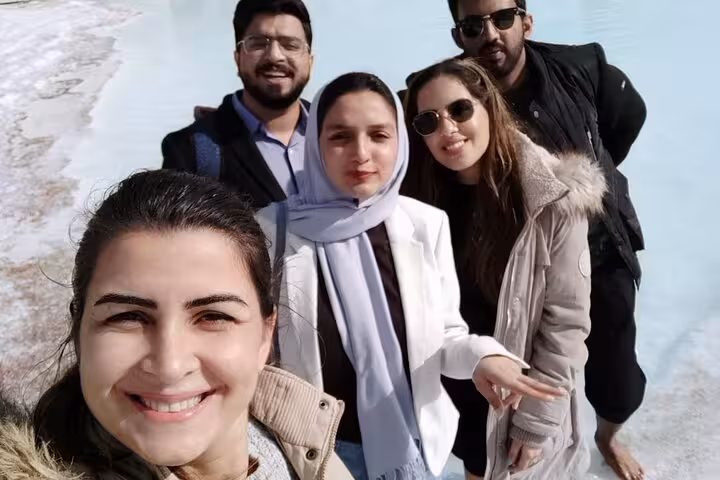 Friends selfie on Pamukkale white travertine terraces during a private tour from Denizli Airport, Turkey