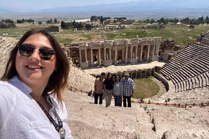 Group selfie at Hierapolis theater overlooking ruins on a private Pamukkale tour from Kusadasi or Selcuk