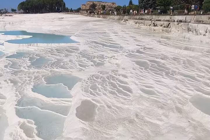 Pamukkale white travertine terraces and turquoise pools on 2-day Ephesus & Pamukkale tour from Istanbul