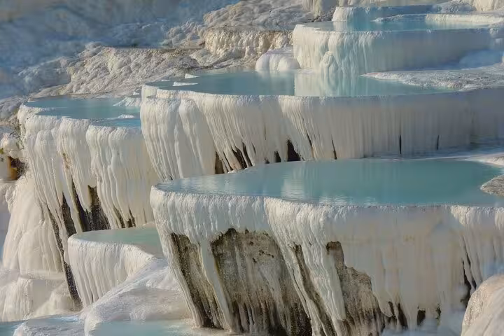 Pamukkale white travertine terraces and thermal pools, must-see on the 8 Day Touch of Mediterranean Tour
