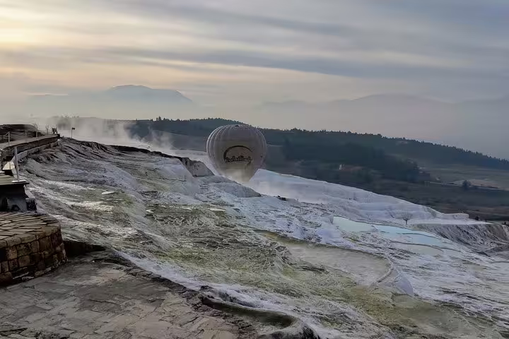 Pamukkale travertine terraces at sunrise with thermal pools, highlight of 8-day Turkey mini group tour