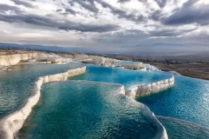 Pamukkale travertine terraces and turquoise thermal pools, highlight of 8-day Turkey tour itinerary