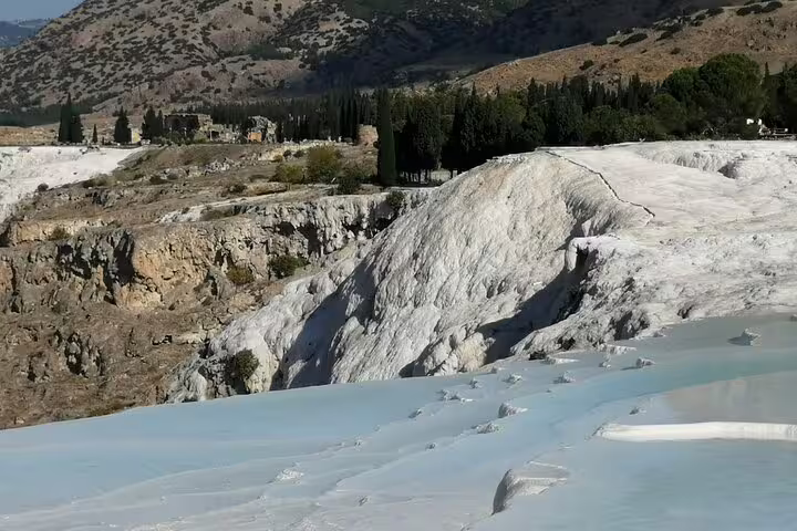Pamukkale white travertine terraces and thermal pools, a highlight on Turkey 11-day guided tour with flights