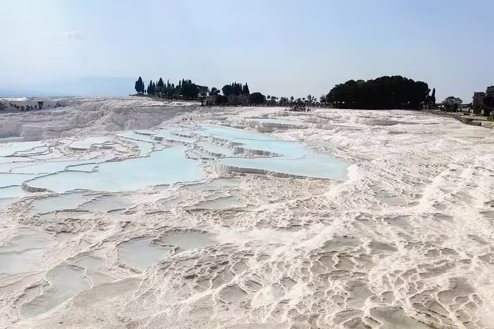 Pamukkale white travertine terraces and turquoise pools on an 8-day Turkey mini group flight tour
