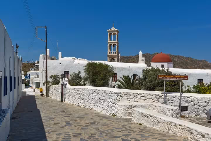 Whitewashed Panagia Tourliani Monastery in Ano Mera, Mykonos walking stop on 5-senses island tour