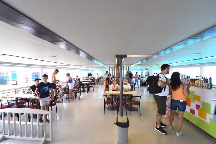 Inside Panorama semi-submarine in Hurghada with snack bar and seating area before Red Sea snorkeling stop
