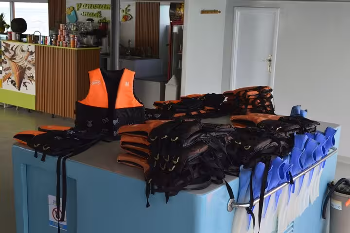 Life jackets and snorkeling vests ready onboard Panorama semi-submarine tour from Hurghada, Red Sea