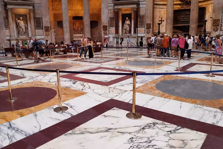 Discover the intricate marble floor patterns of the Pantheon, a stunning example of Roman architectural design.