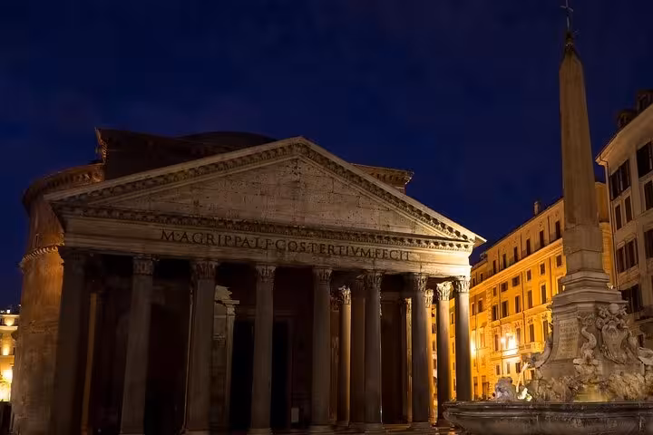 The Pantheon illuminated at night, showcasing its ancient Roman architecture on Rome's Bone Crypts and Ghost Tour.