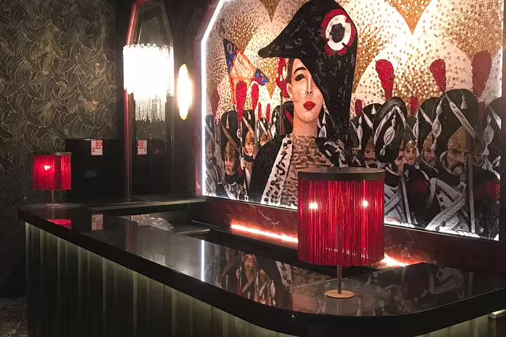 Ornate mosaic mural with Napoleonic figures at Paradis Latin cabaret venue in Paris