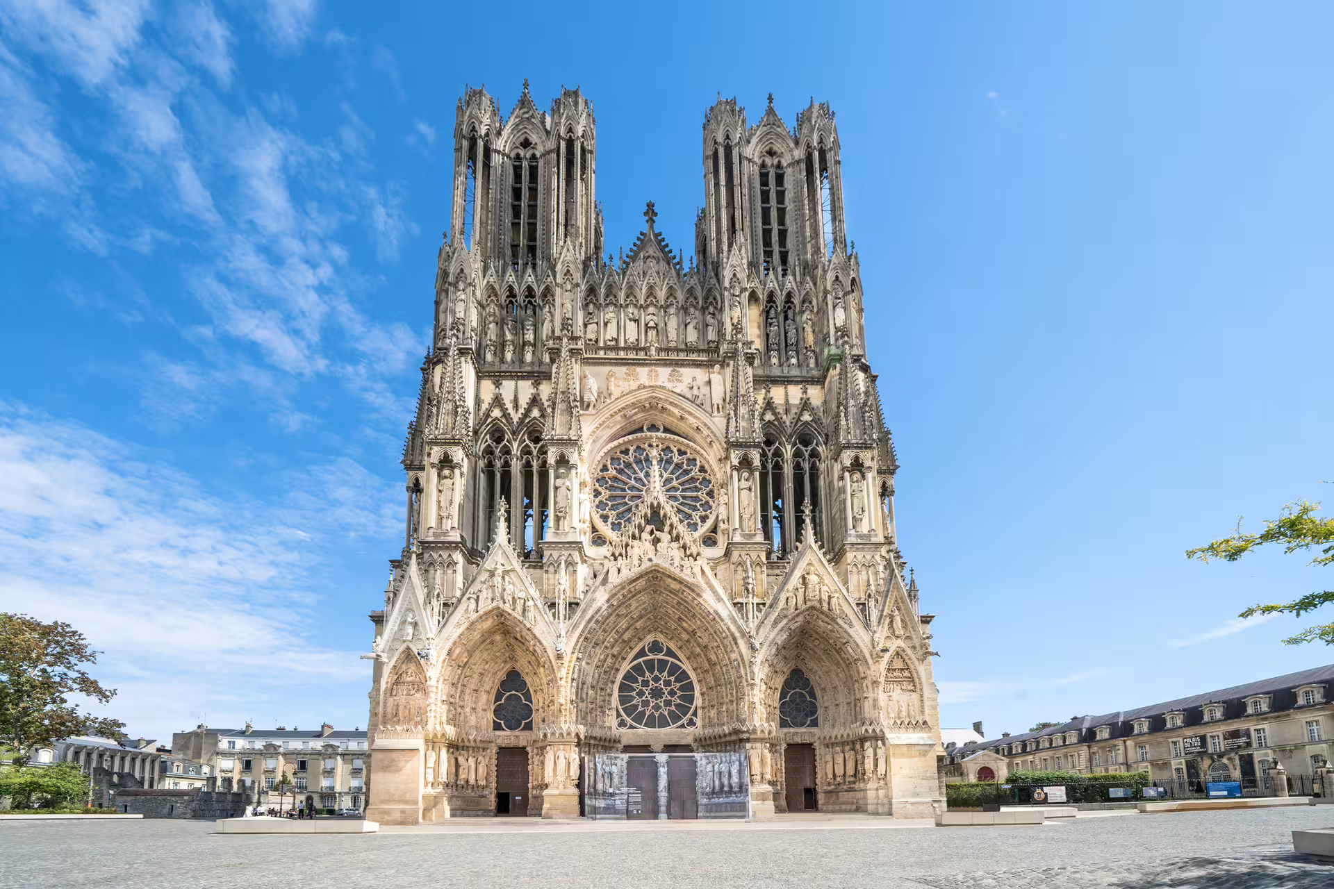 Gothic cathedral facade in Paris, scenic stop on 1-day foodie walking tour with multilingual audioguide