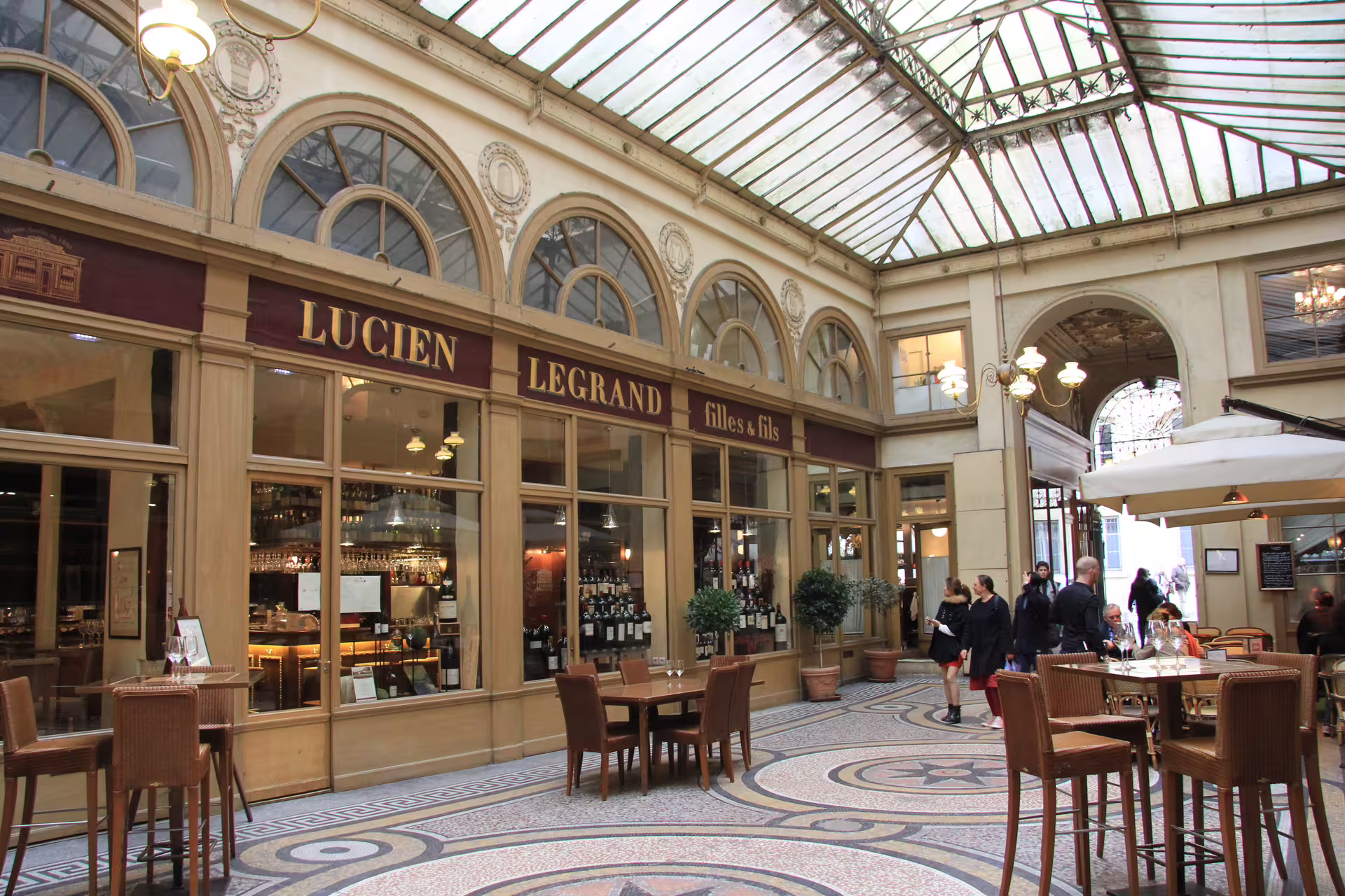 Lucien Legrand filles et fils wine shop inside a Paris covered passage with mosaic floors and glass ceiling