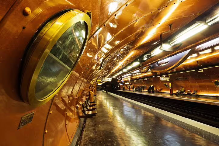 Paris metro station with a futuristic design, part of the Paris Private Tour featuring skip-the-line Louvre tickets and French crepes.