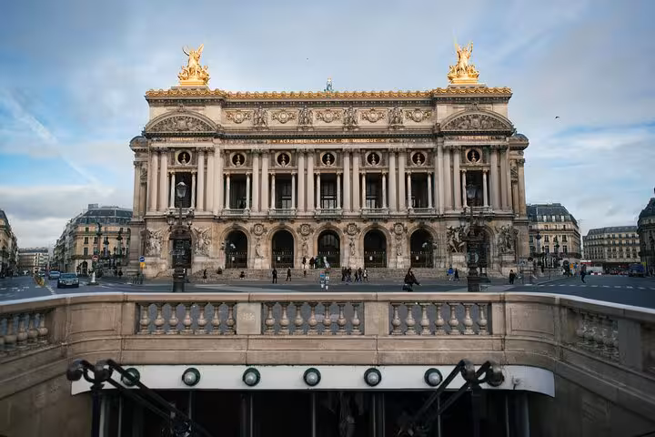 Palais Garnier Opera House facade with golden sculptures in Paris city center